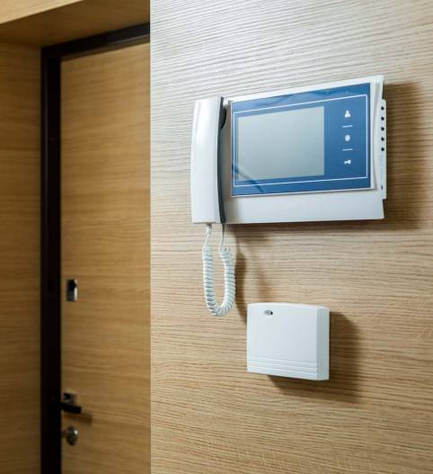home video intercom on a wooden wall home video intercom on a wooden wall